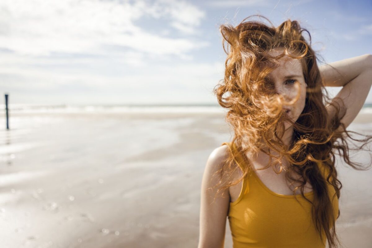beautiful redhead enjoying the beach in Constanta romania