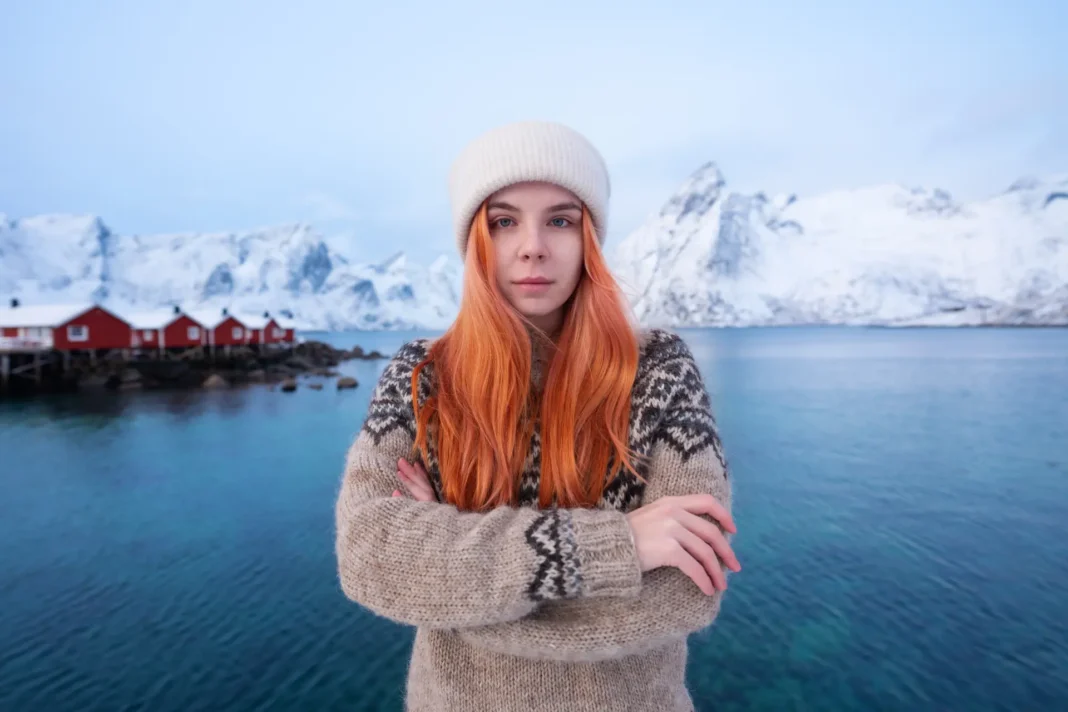 Norwegian woman posing near tje lofoten islands