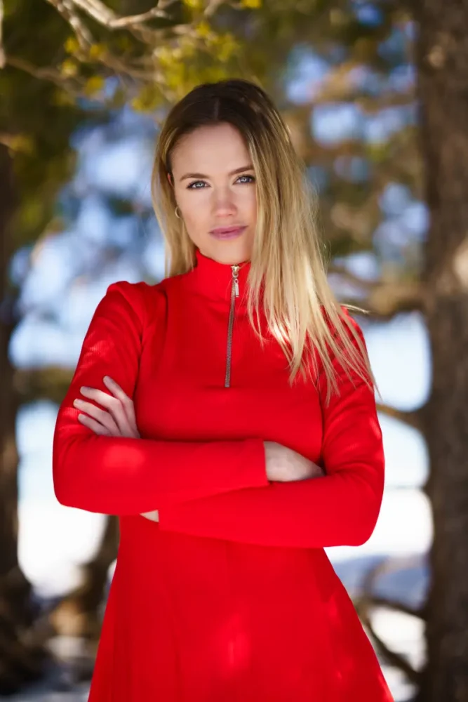 blonde Norwegian woman wearing red dress
