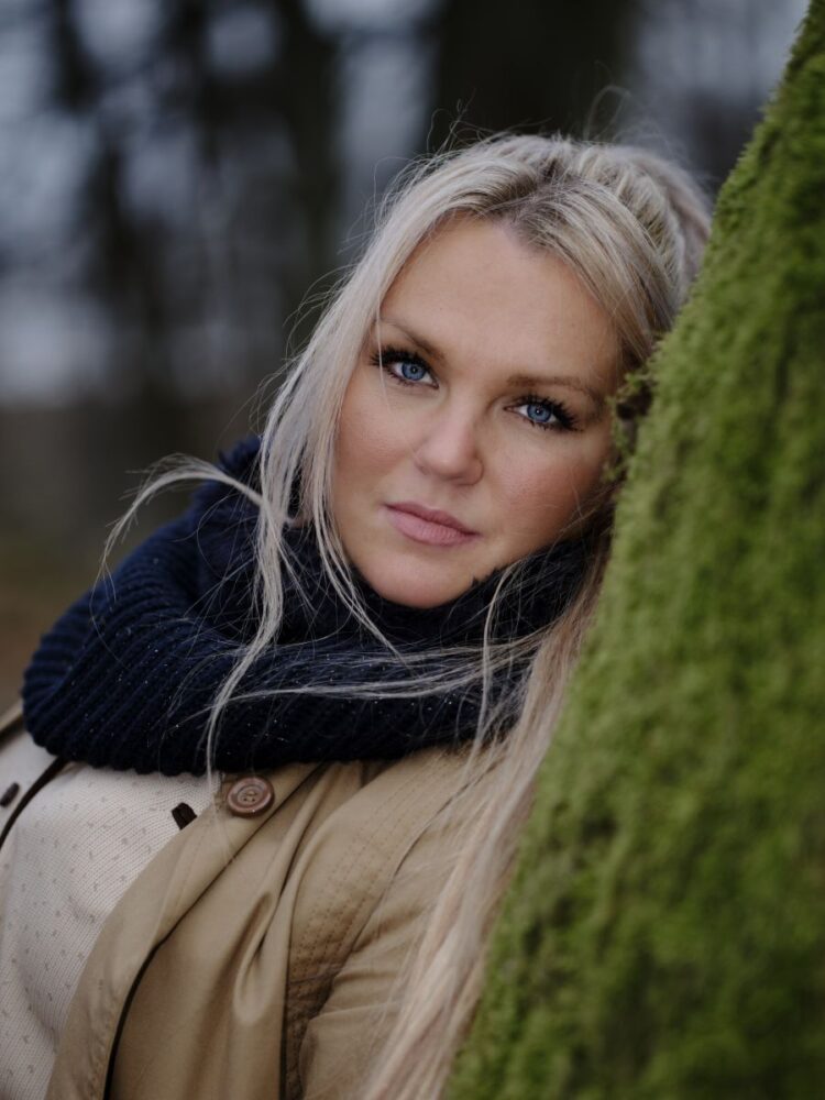 young blonde woman with blue eyes