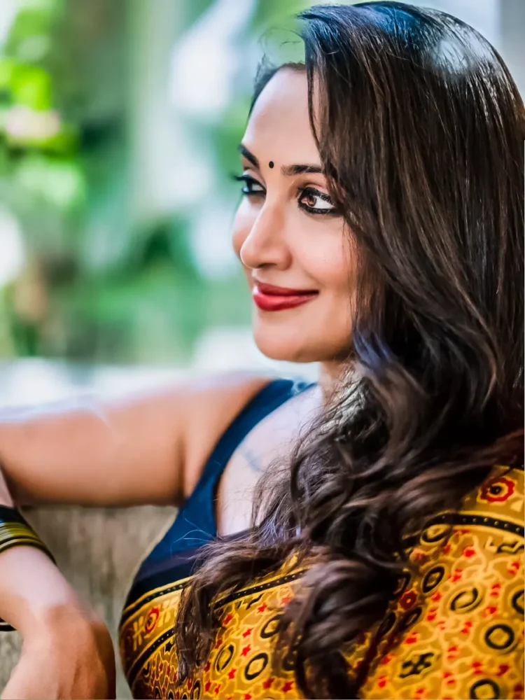 elegant and beautiful young Indian woman wearing traditional clothes