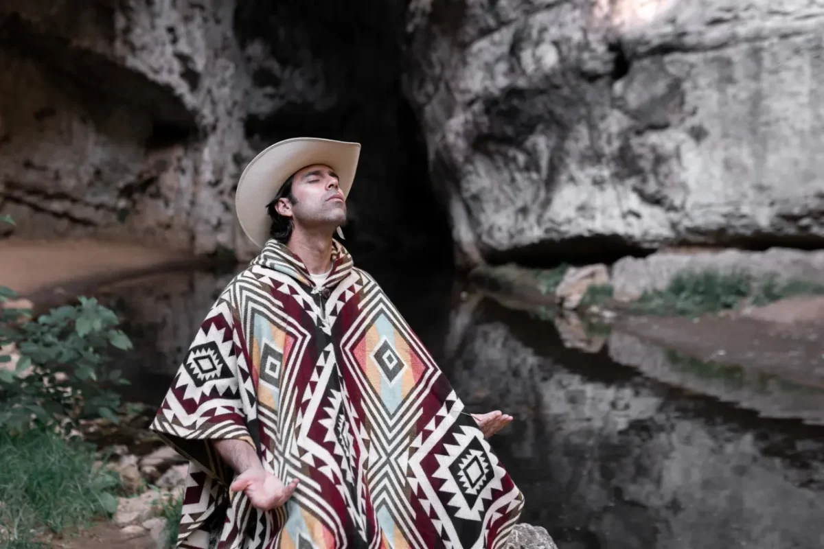 Mexican man wearing traditional poncho