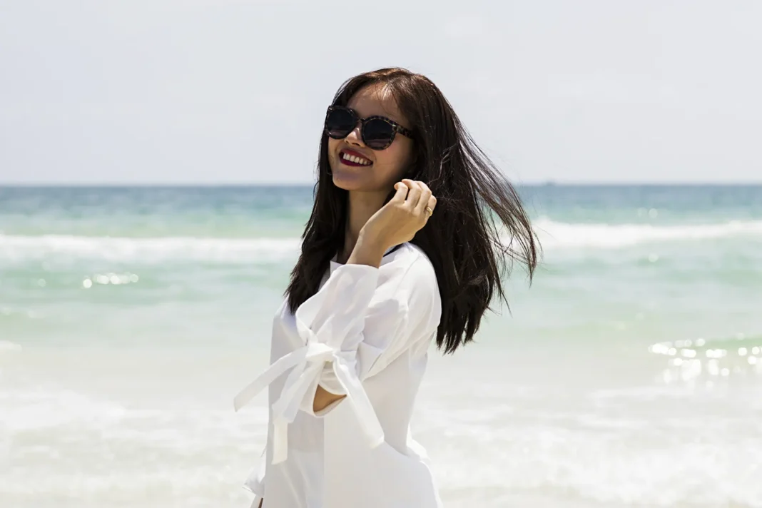 beautiful Vietnamese woman enjoying the sea