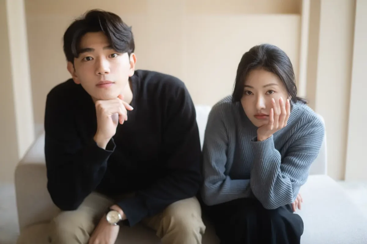 contemplative Korean couple