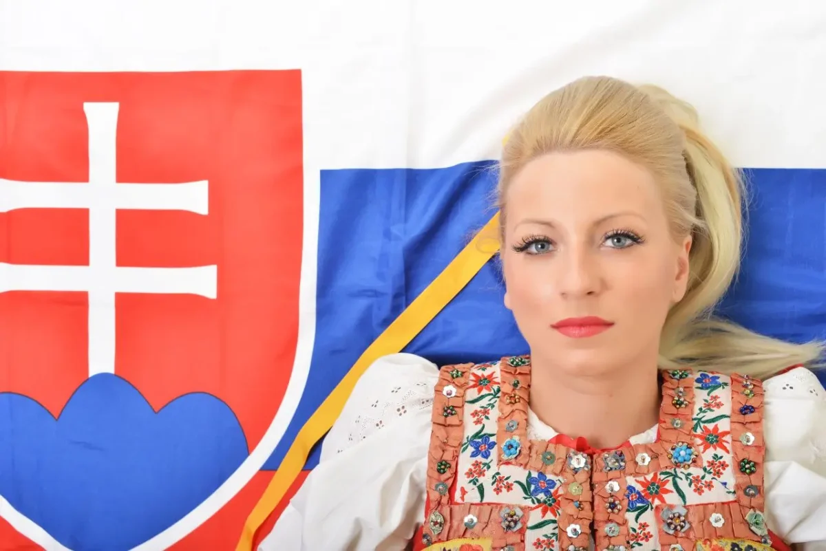 woman laying on Slovakia flag
